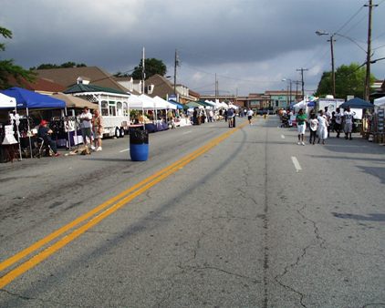 Main Street with storm clouds before Tucker Day