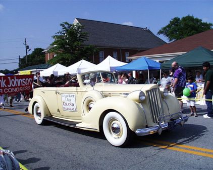white convertible with grand marshall